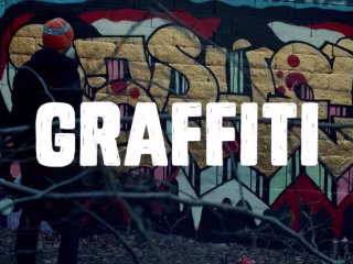 Graffiti with artist RAPHE