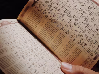 Breaking the Language Barrier: The Difficulty of Translating Arb
