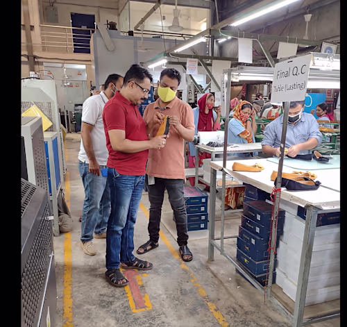 "At Final Q.C station - checking every pair before shipment....