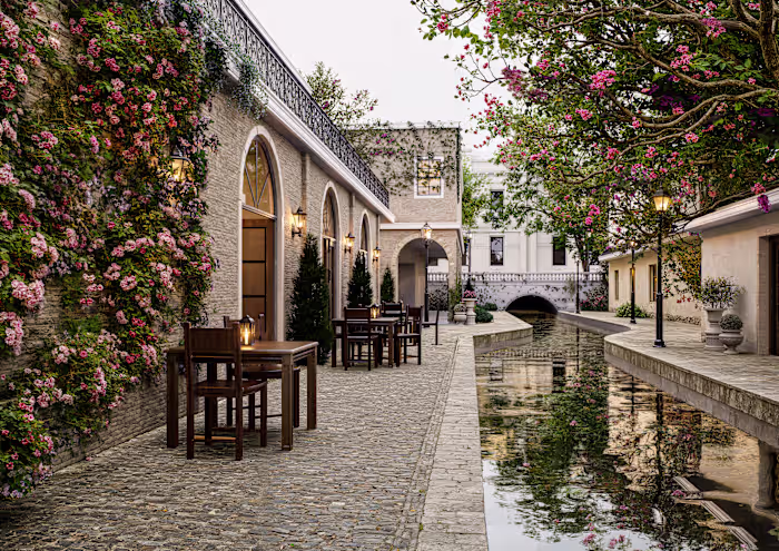 An elegant riverside cafe blending timeless architecture wit...