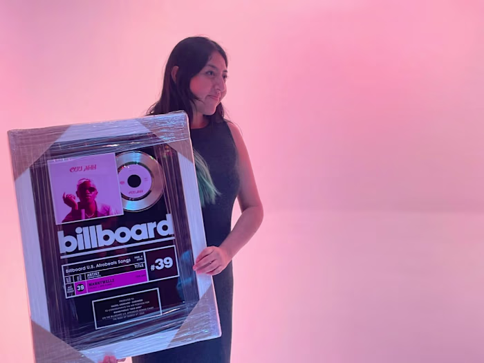 Received Billboard Top 100 Plaque