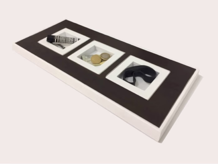 This versatile valet tray, projected