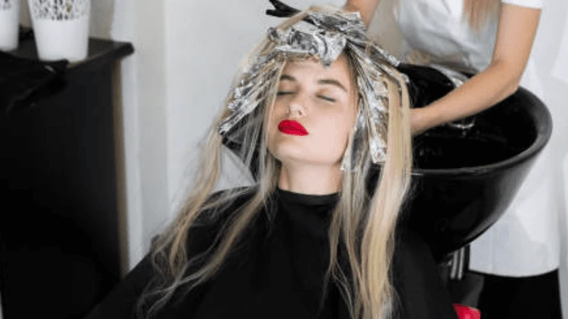 Woman with bleach in hair.