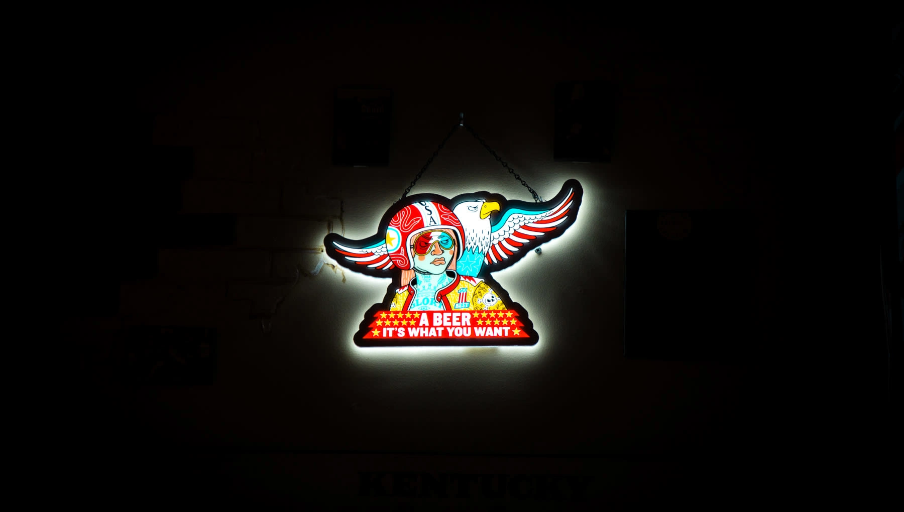 Backlit A Beer signage.