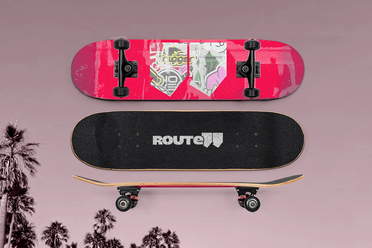 Grunge deck art, featuring the Route99 "Number" logo 'in and overlayed with a collection of stickers.
