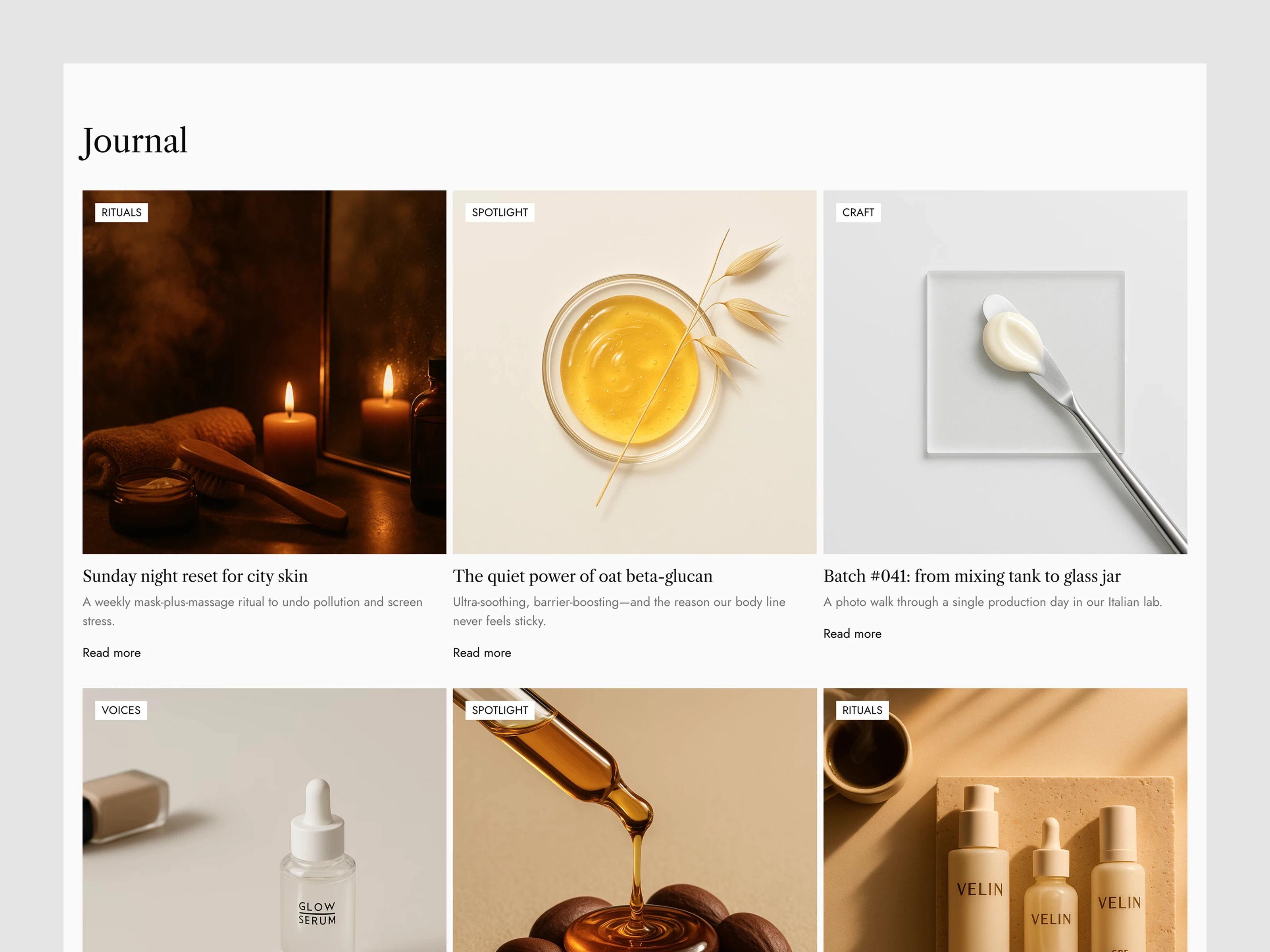 Journal page with clean article previews and minimal grid layout.