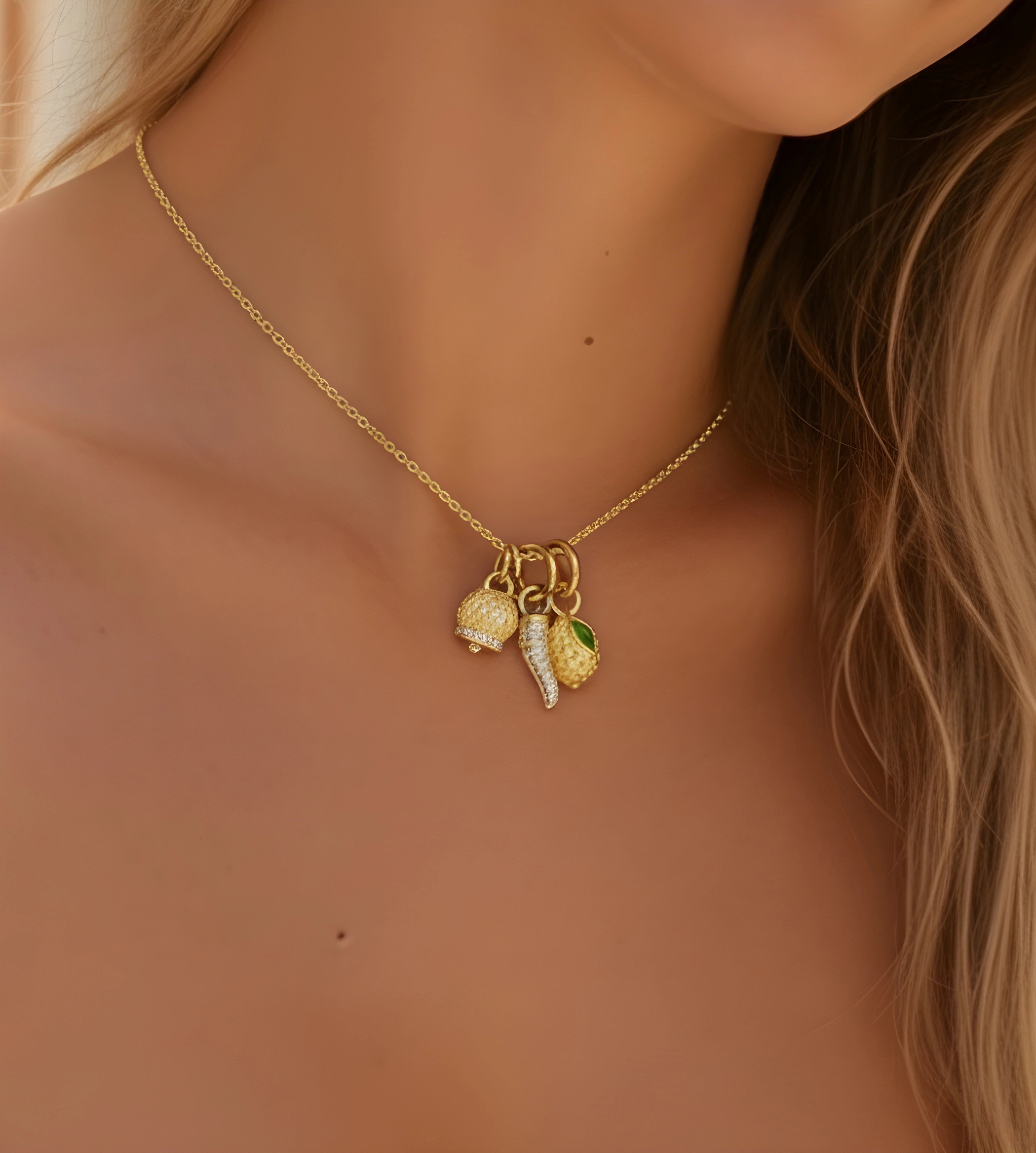 Detailed shot of the Capri Bell jewelery on the model