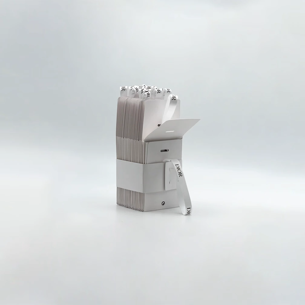 Back of a pack of pouches. I have also designed the belt around which is made of paper waste.