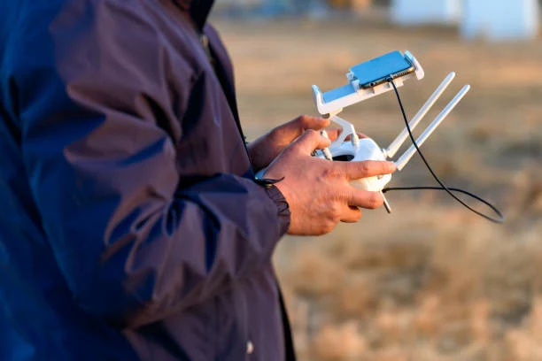 Man operating a Drone