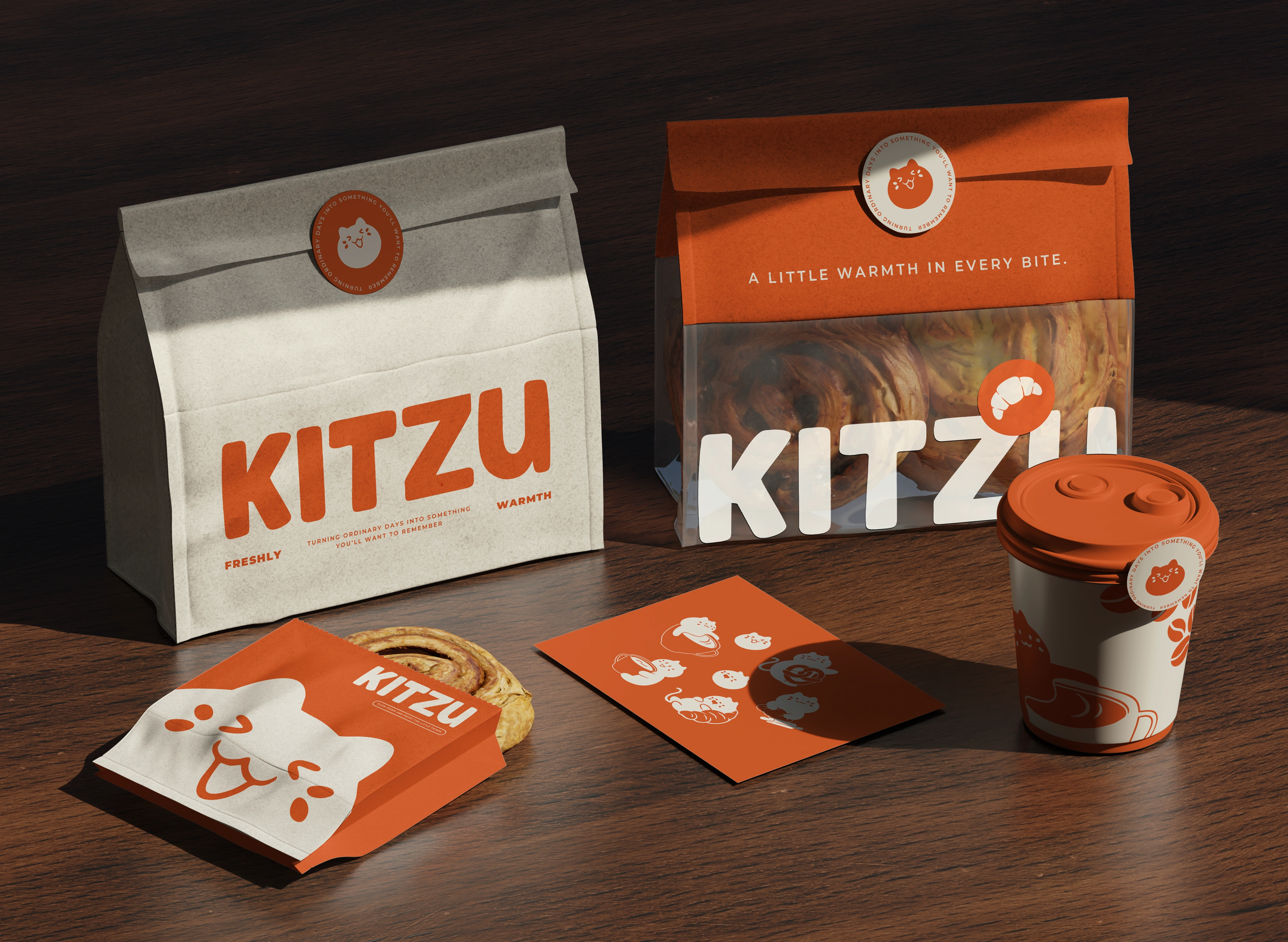Kitzu packaging set showing coffee cup, pastry bags, stickers, and cozy brand identity.
