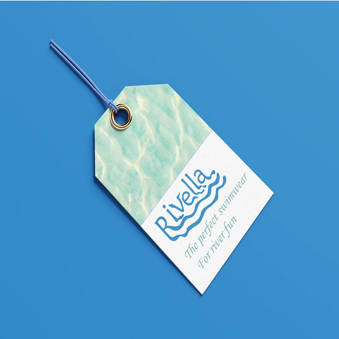 Mockup of the swimwear tag i designed. the roundness and waviness and the serif type font of the taglines contrasts well. and water graphic above them makes it clear these are swimwear.