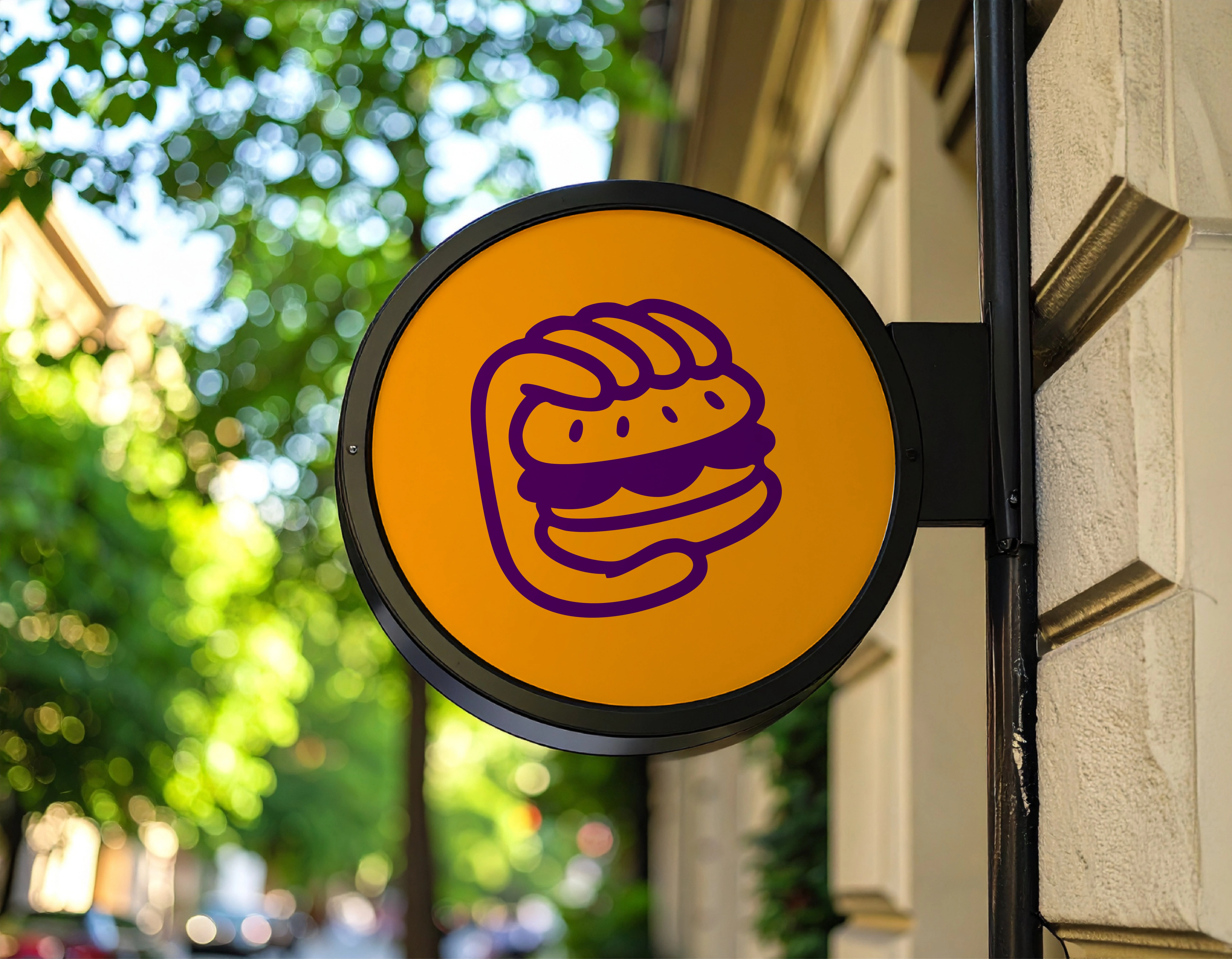 Vibrant Munchies brand mark applied to outdoor signage for instant recognition