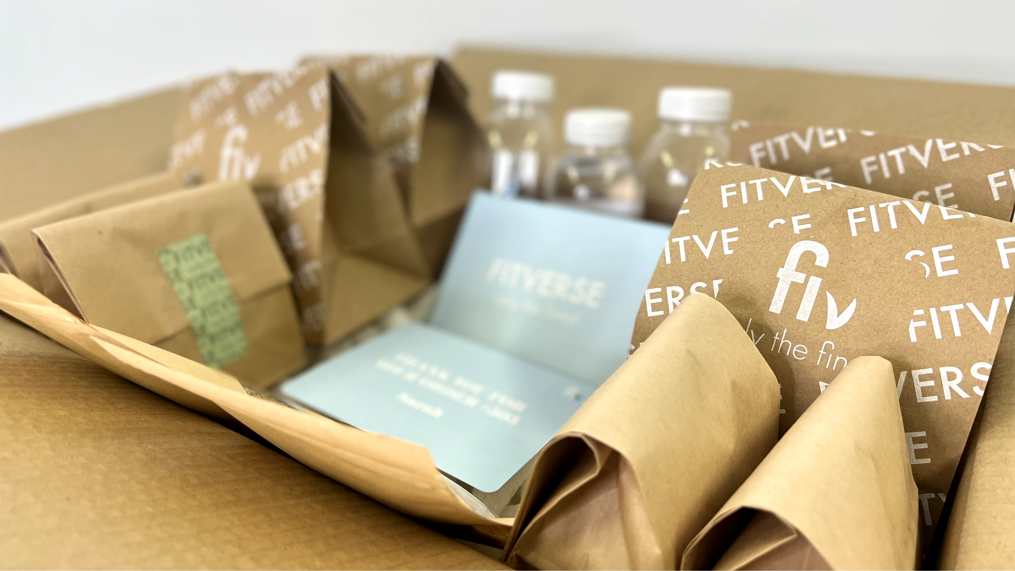 Within the box, there is a blue letter, which is a thank-you card that expresses our appreciation for our customers' loyalty and their desire to use our diet plan.