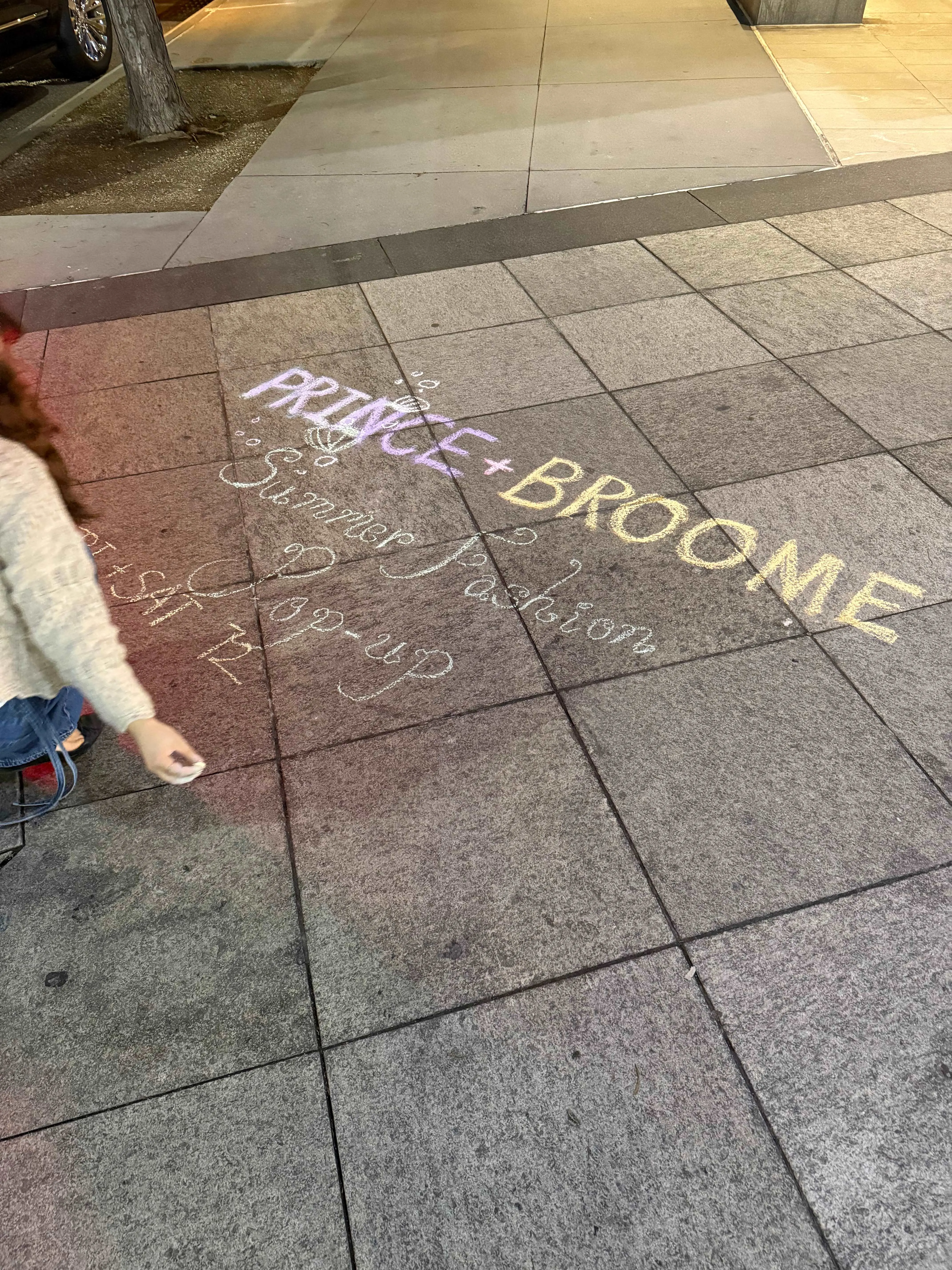 Sidewalk chalk art around the pop-up shop to draw attention to the store