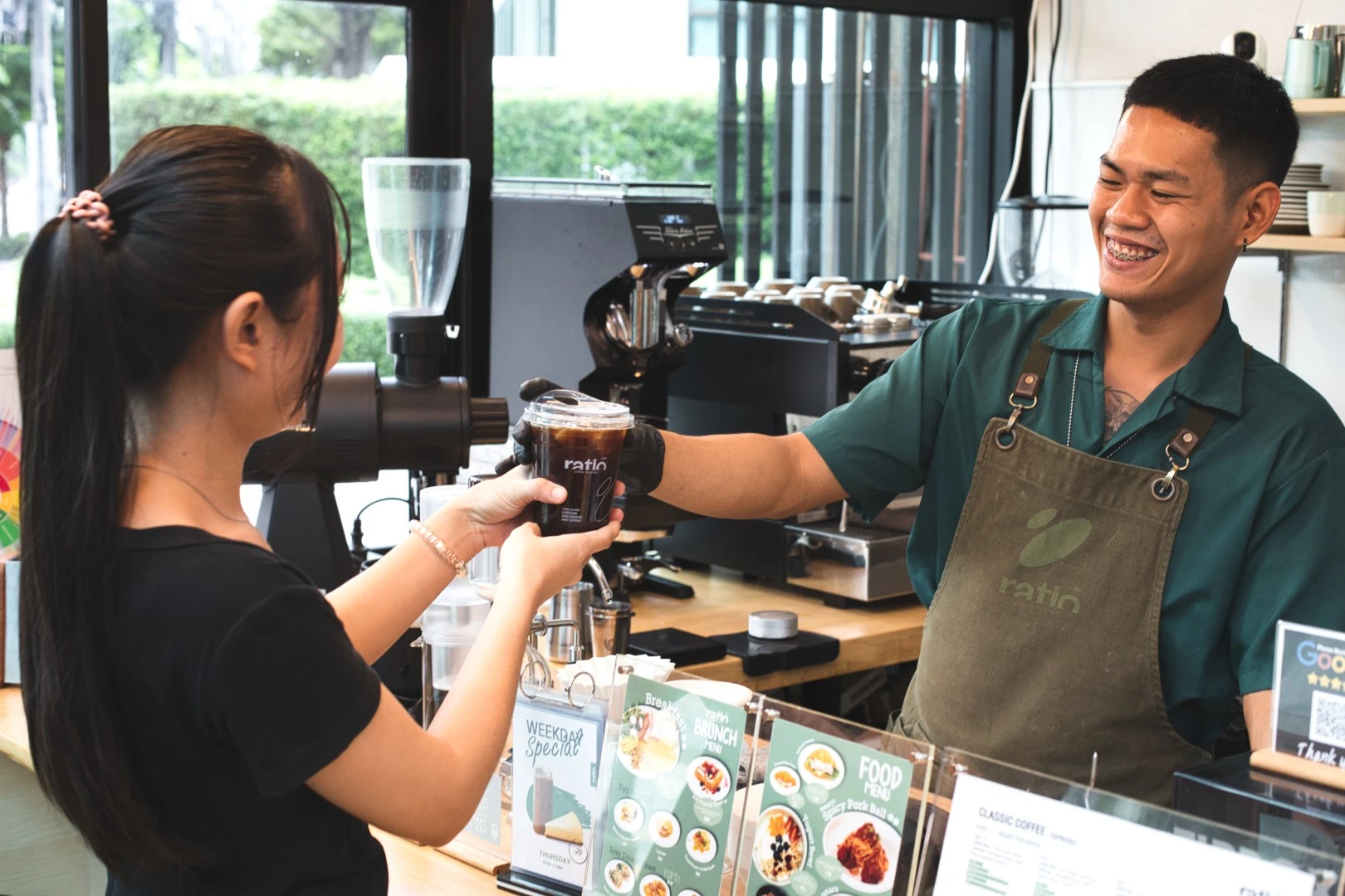 Staff serving freshly brewed coffee