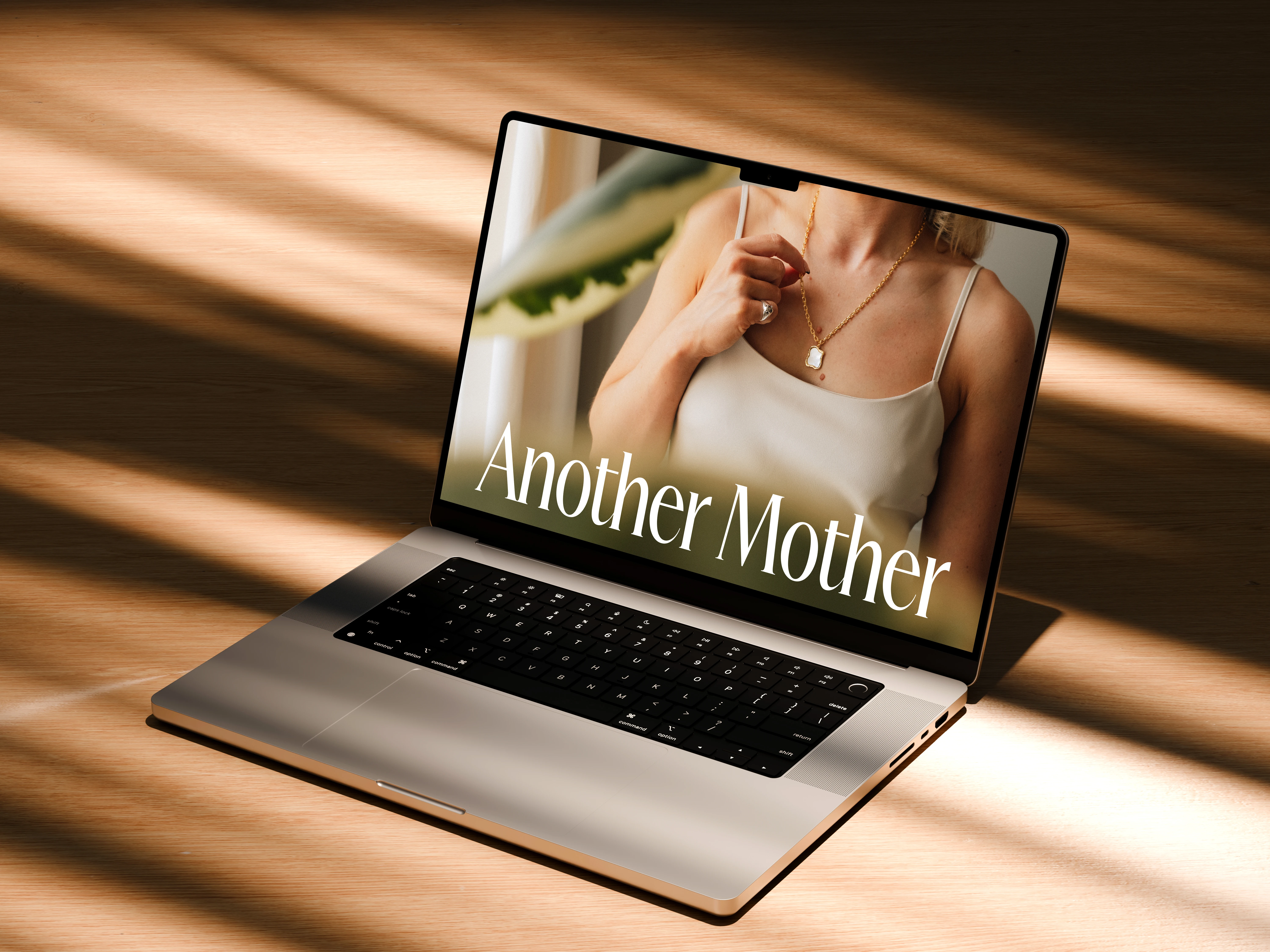 Another Mother campaign image on laptop