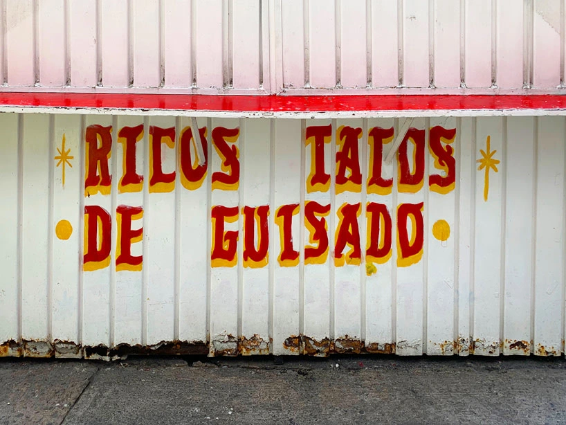 kurt hollander on mexico city's ban of all the colorful, hand-painted street stall signs, photo by Mario Pérez