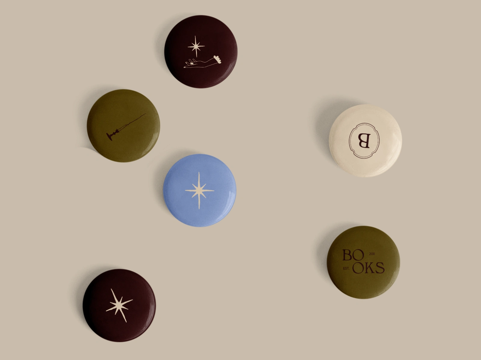 Again, different custom brand elements on pins that can be used on tote bags, backpacks, clothes etc.