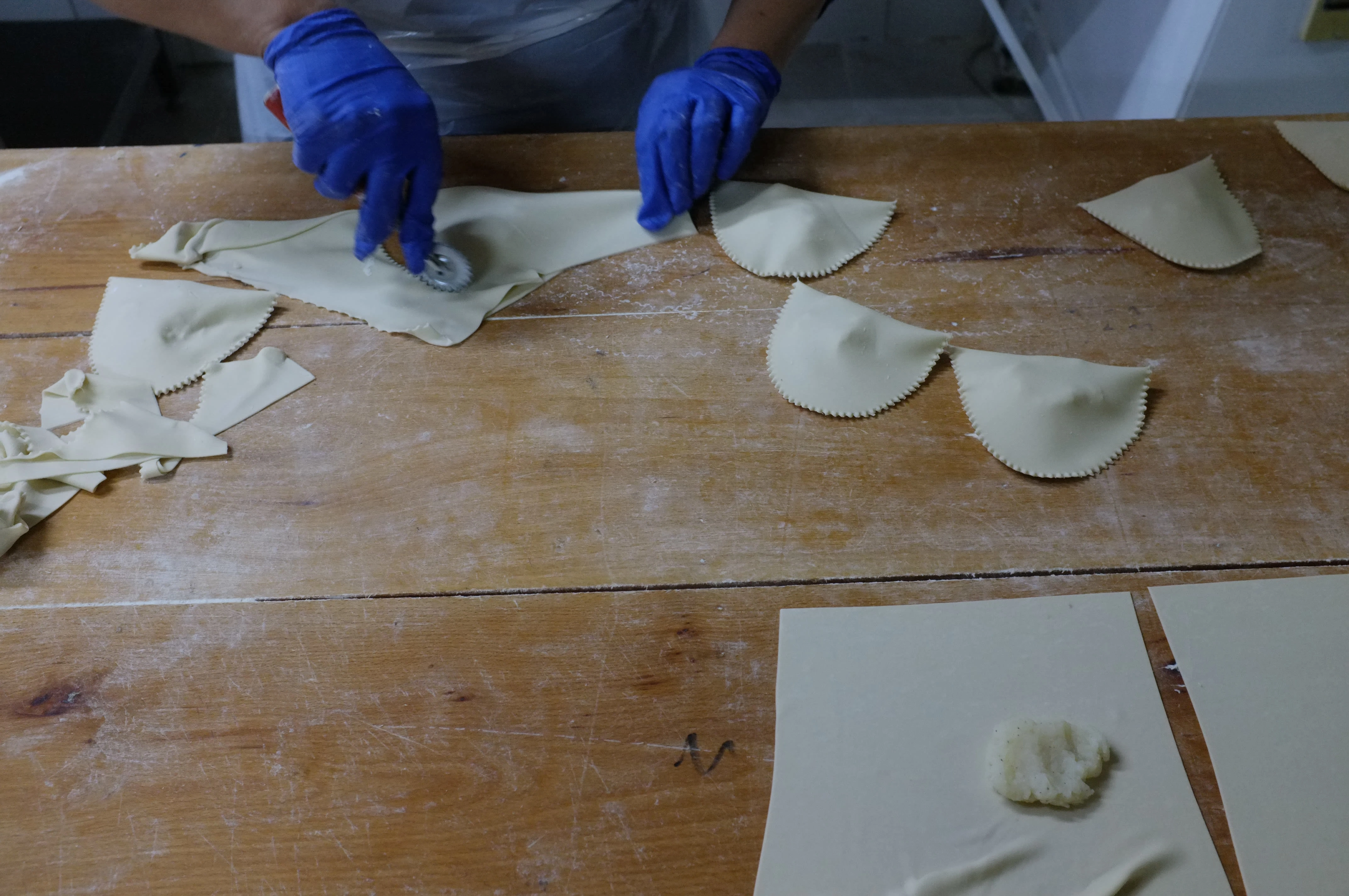 A Circassian woman prepares traditional pastries in Amman, Jordan