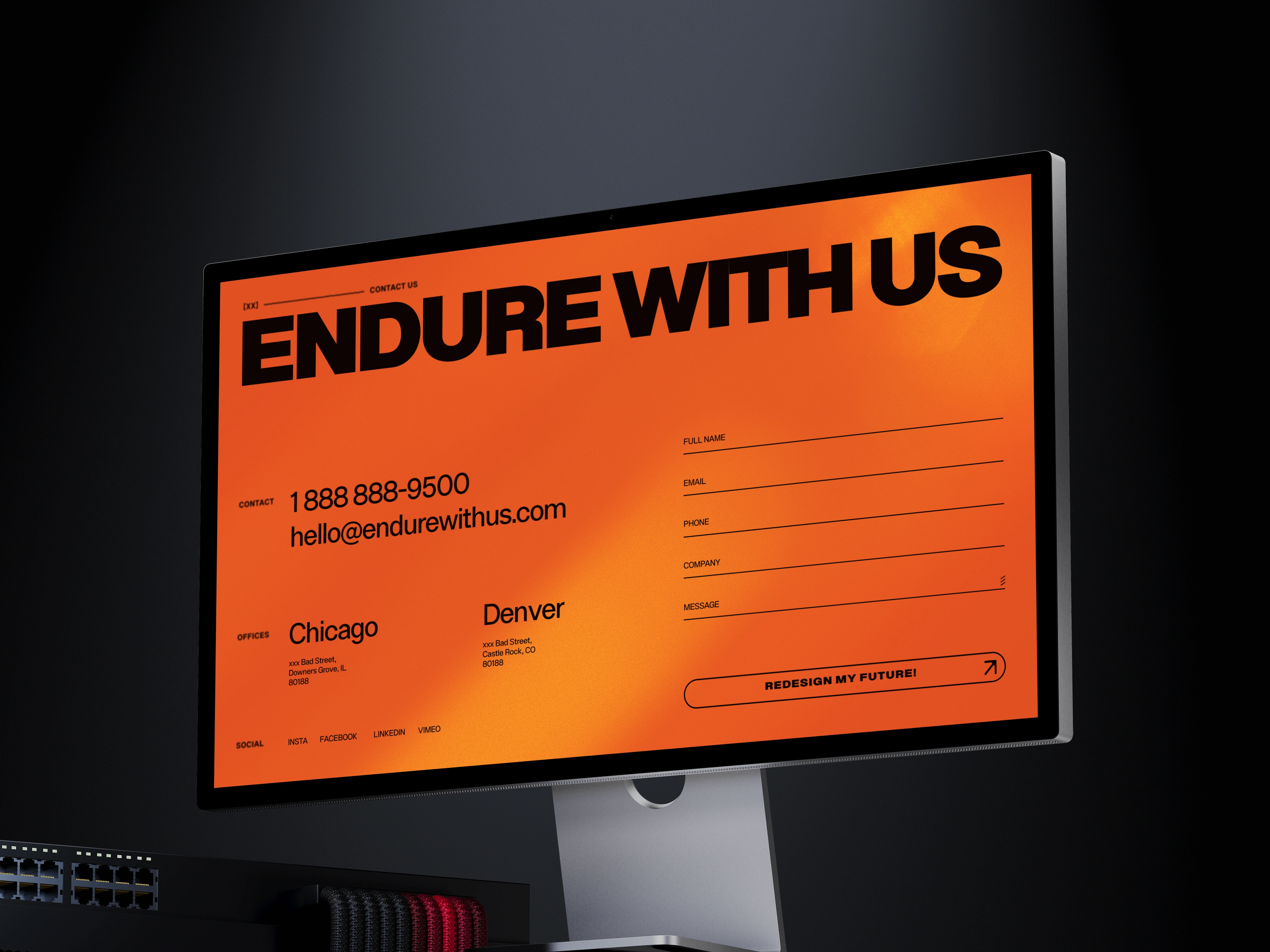 Endure Group website contact page on a Studio Display, showing a bold "ENDURE WITH US" headline over a bright orange background with phone, email, Chicago and Denver office addresses, and a contact form.