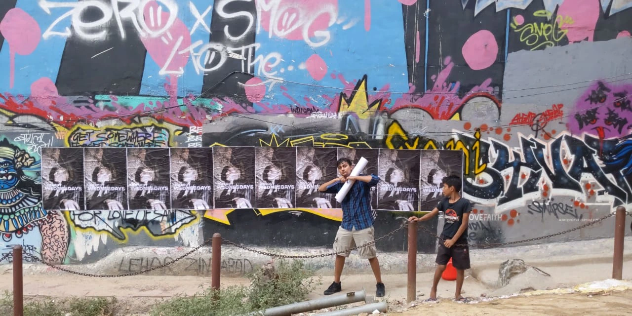 Weekly posters that were plastered in every nook possible.