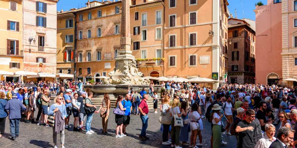 Tourists on Pantheon square in Rome, Italy, where it's advisable to have travel insurance for Italy 