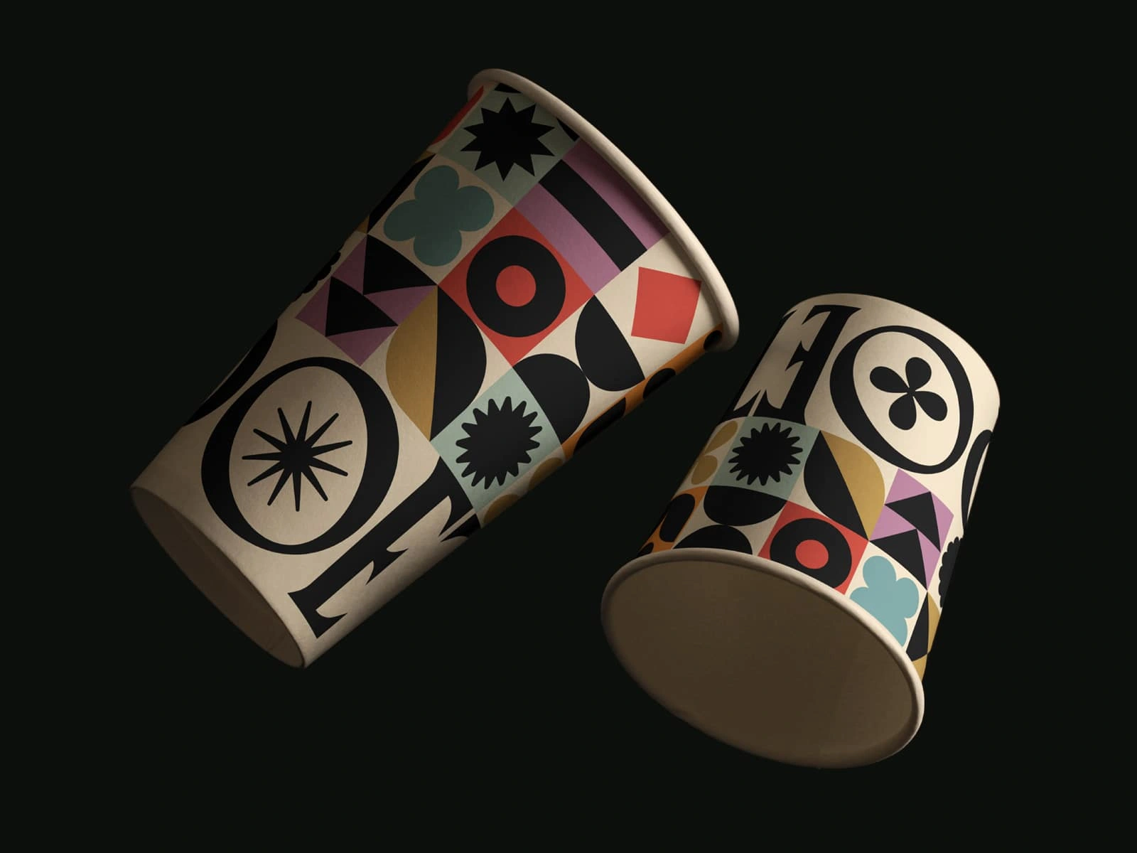 Takeaway cup designs featuring the signature repeating geometric pattern and large logo