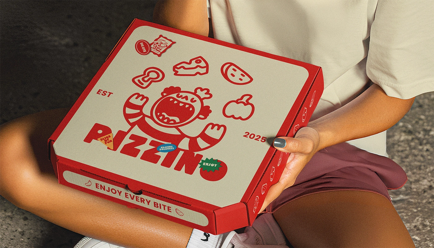 Pizzino pizza box with mascot illustration and red typography showcasing playful branding.