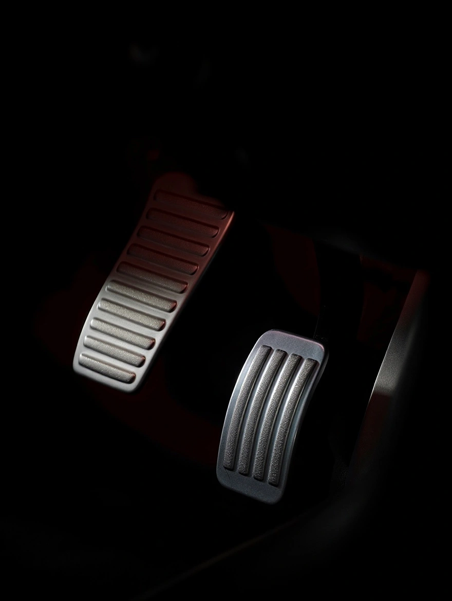 Close-up of a brown leather car seat bathed in warm sunlight, showcasing its ergonomic design and luxurious texture.
