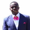 JUSTIN NJUE