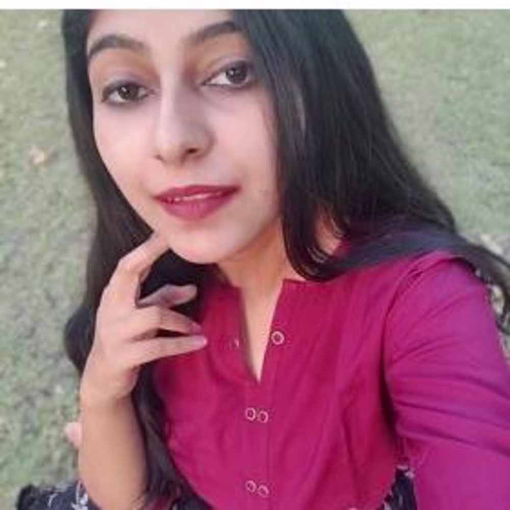 Nisha M
