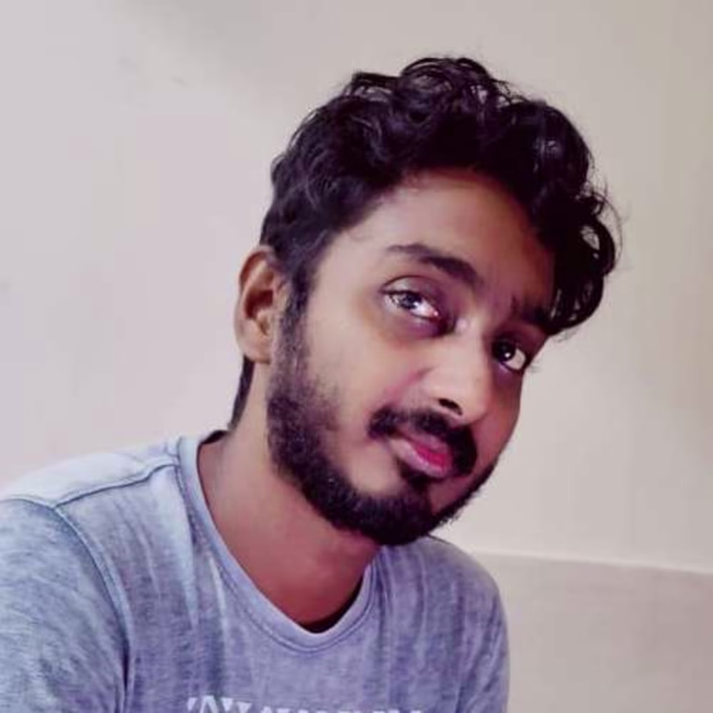 Dinesh M