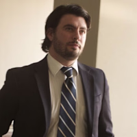 Alec J Caruso