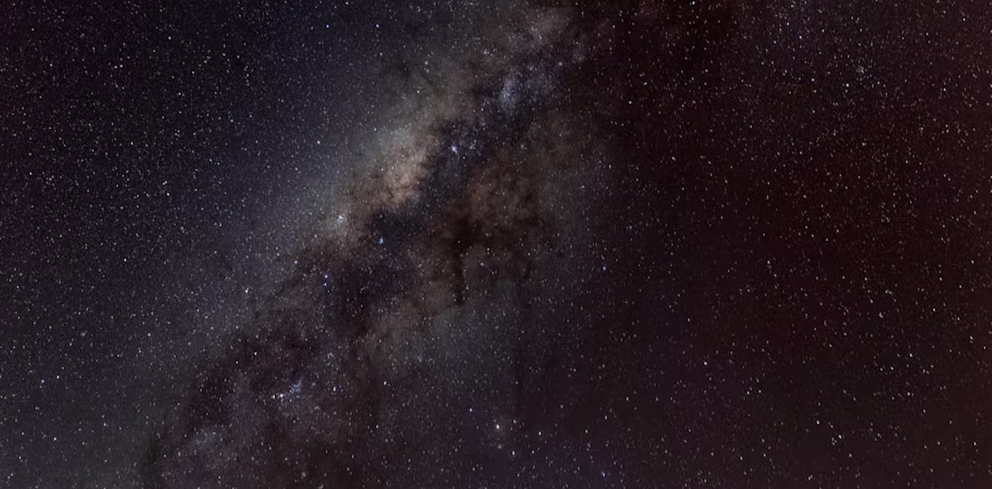 Cover image for Why is space so dark even though the universe is filled with st…