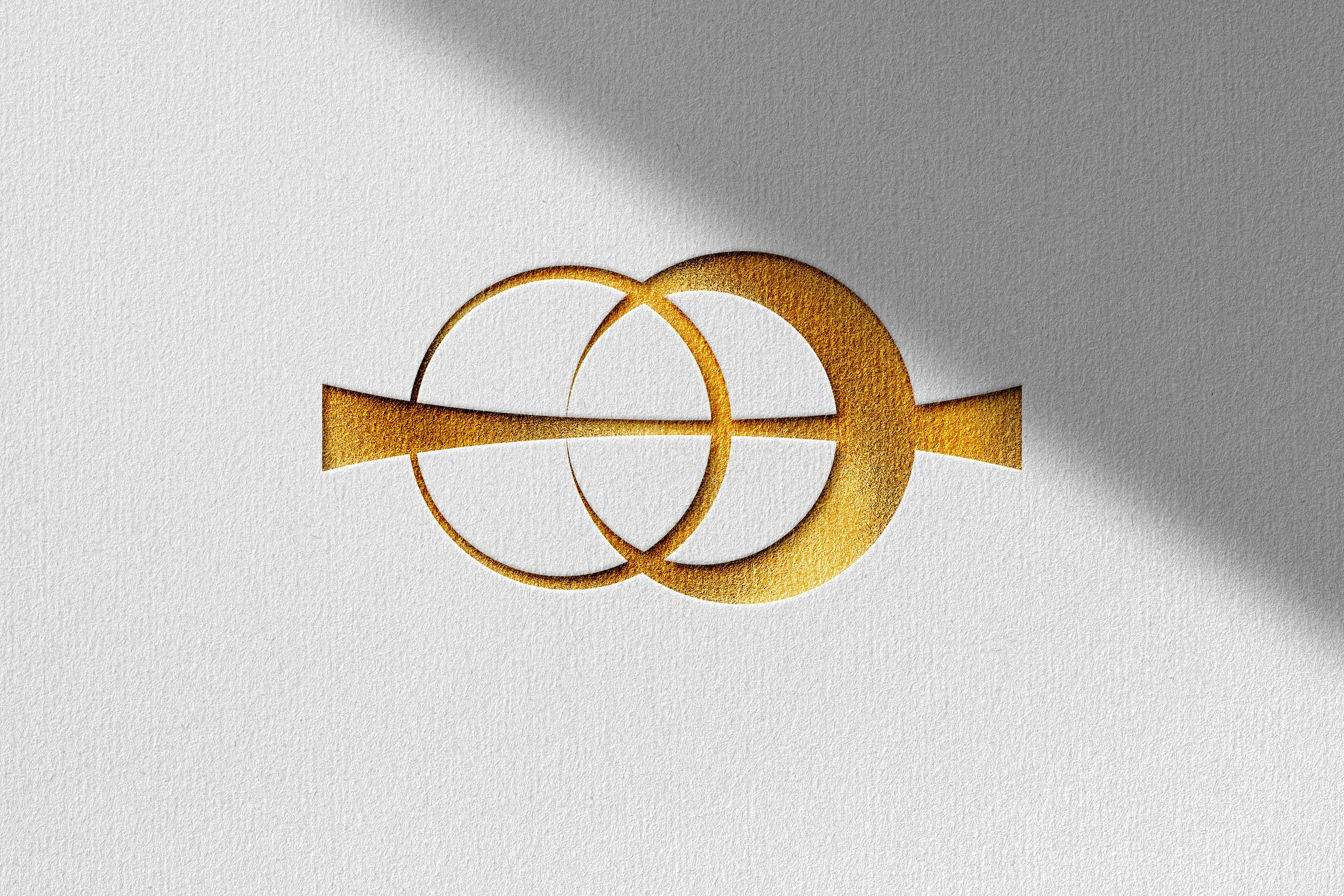 The logo symbol I designed for Jennifer Nichole was inspired by cars, keys and unity. 