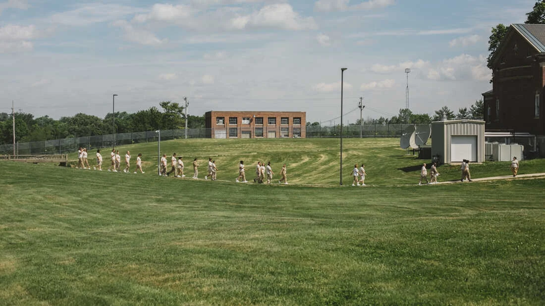 Women walk through the courtyard to lunch at the Indiana Women's Prison in Indianapolis on May 17. (Andrew Spear for The Marshall Project)