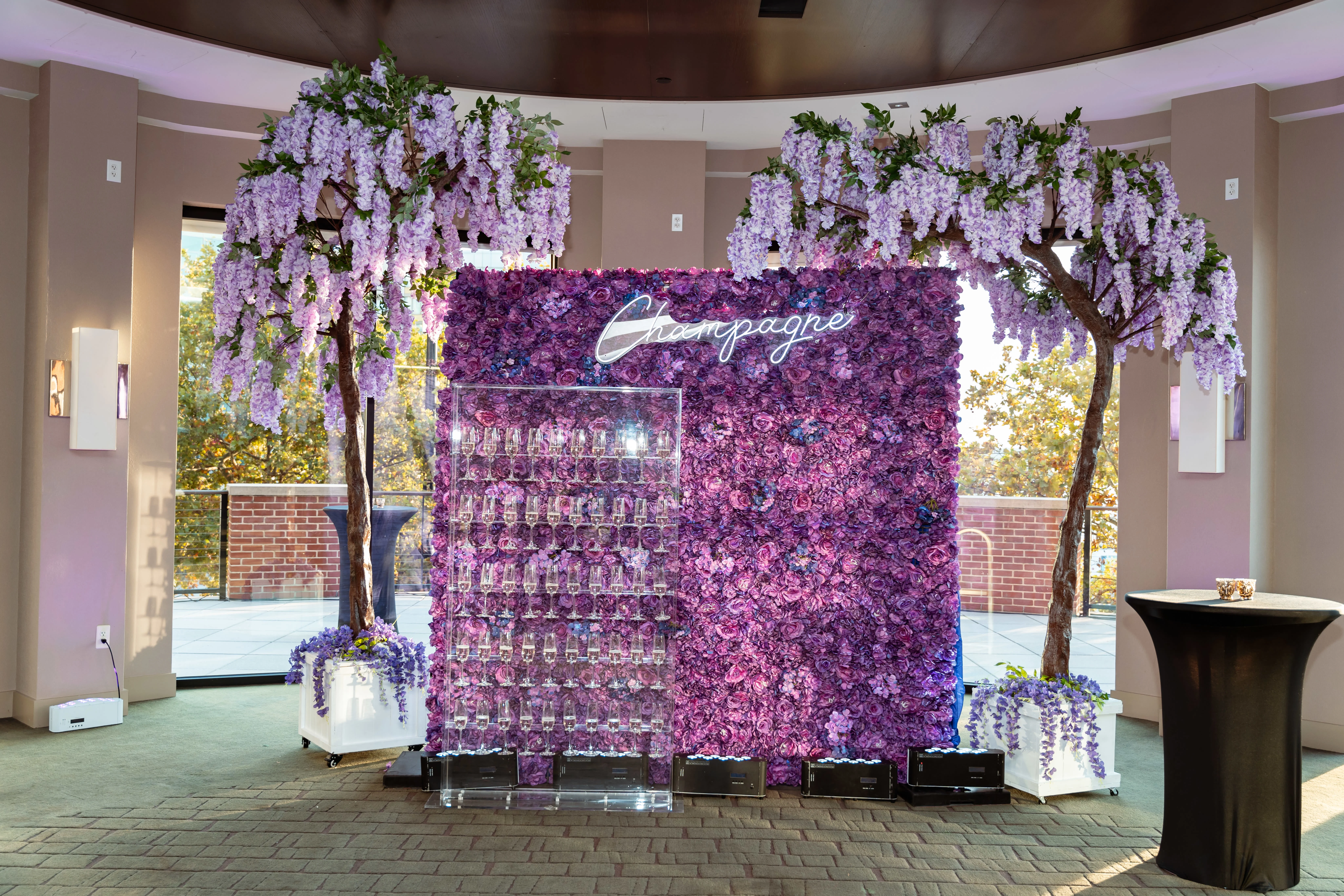 The happy hour featured a Champagne Wall where attendees could help themselves to unlimited beverages. 