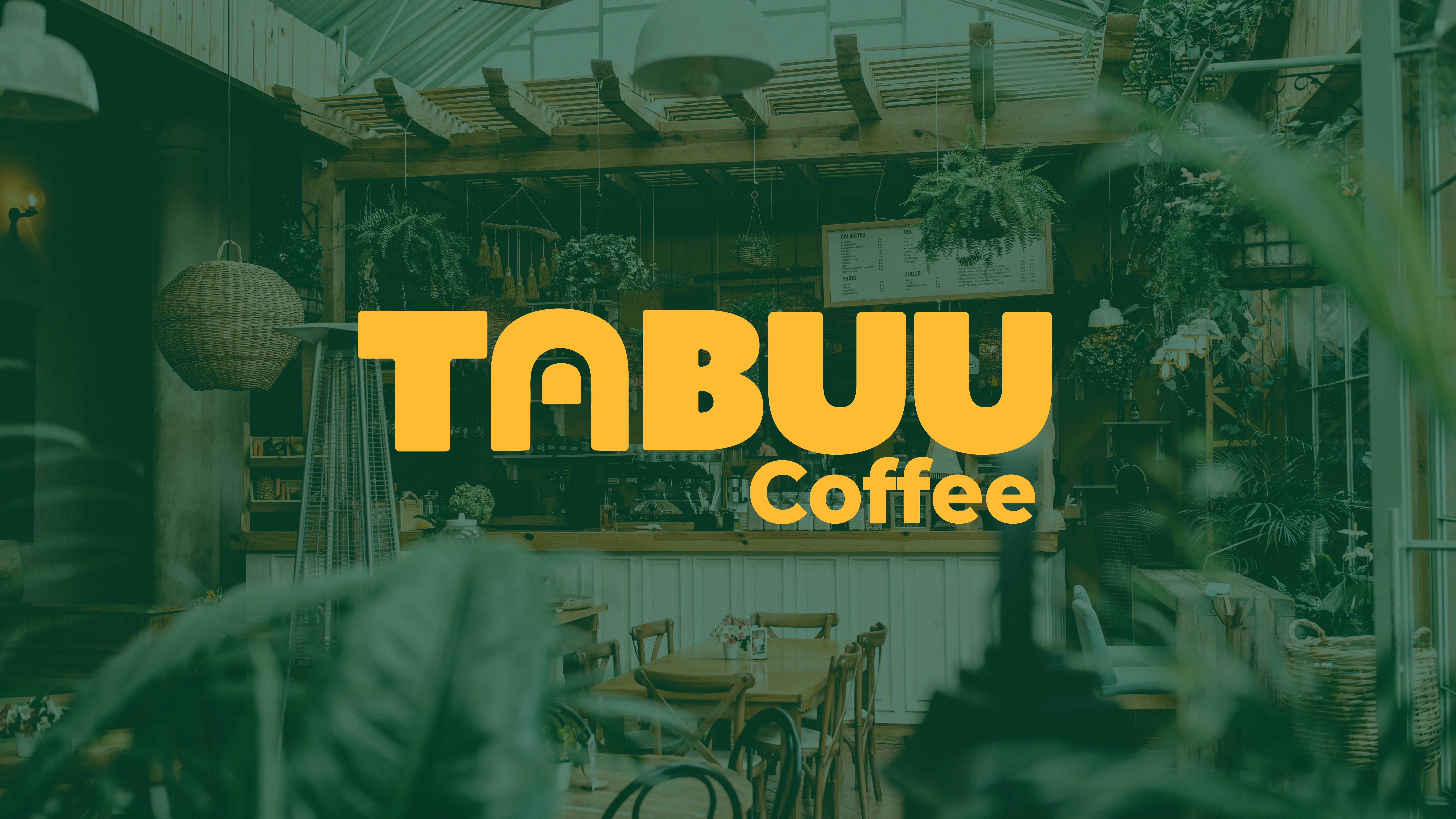 Mockup of Tabuu Coffee logo set on a coffee shop background to showcase the logo juxtaposed with a physical setting that would closely resemble the brand in real life