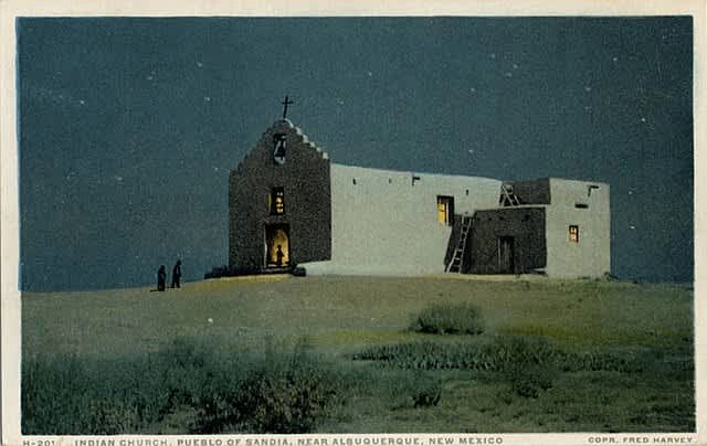 Nuestra Señora de los Dolores Church in Sandía on a Fred Harvey series postcard. The church was already in bad shape in the 1860s, and was eventually replaced by St. Anthony Catholic Church at Sandía Pueblo. Photo via Wikimedia Commons.