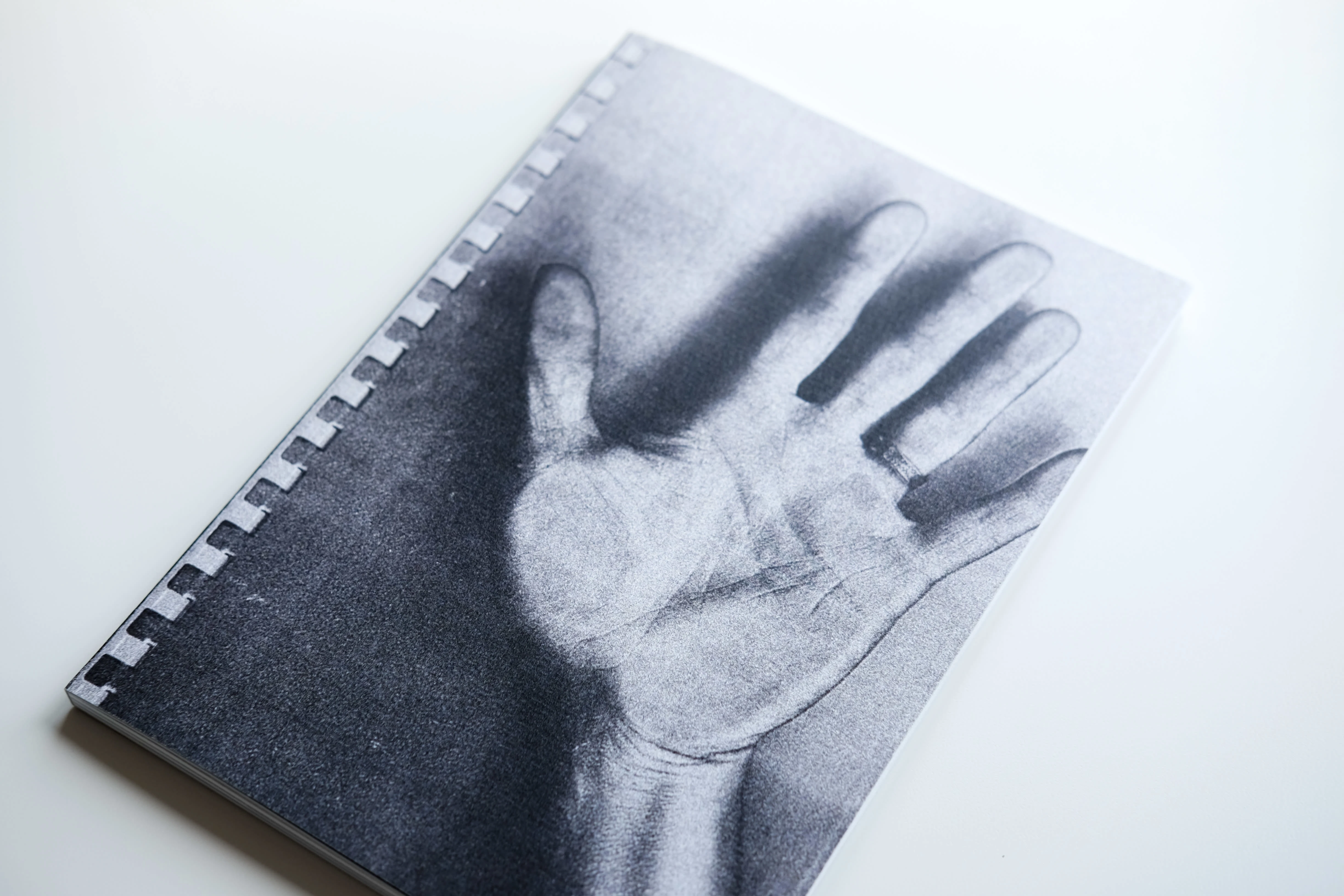 Cover image: a man's hand with a wedding band.