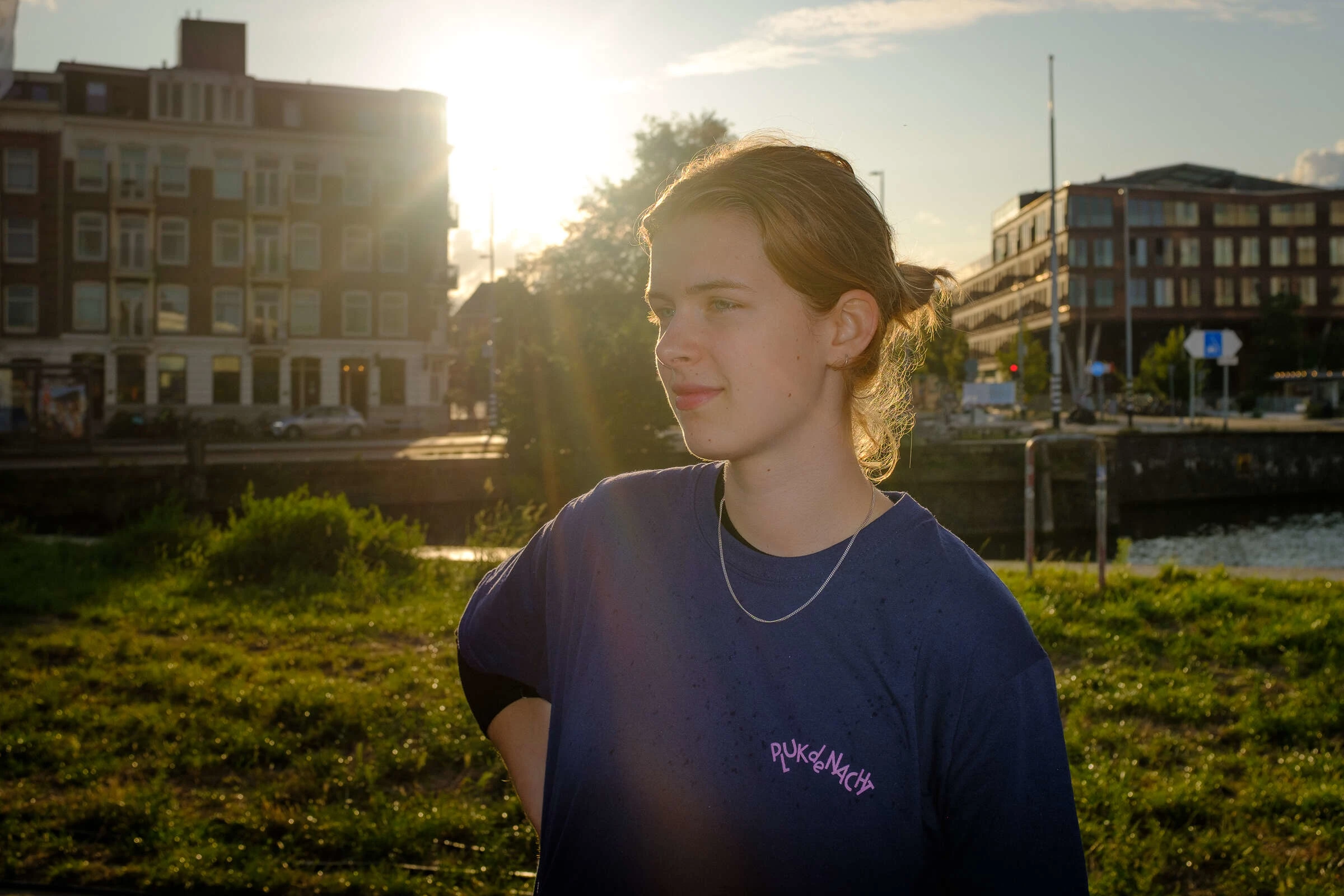 Festival Volunteer, wearing a Merch T-shirt with one of the new Festival Logotypes