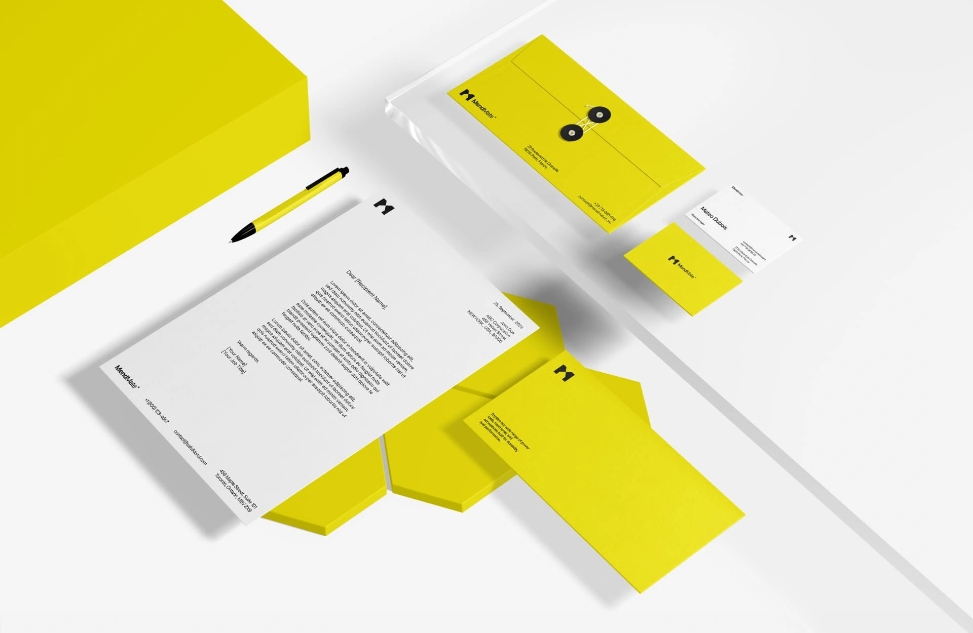 this stationery set combines minimalism with vibrant yellow accents, reflecting the brand’s energy and focus on quality. Each piece, from letterheads to business cards, reinforces a professional yet approachable look, ensuring Mendmate stands out in every interaction.