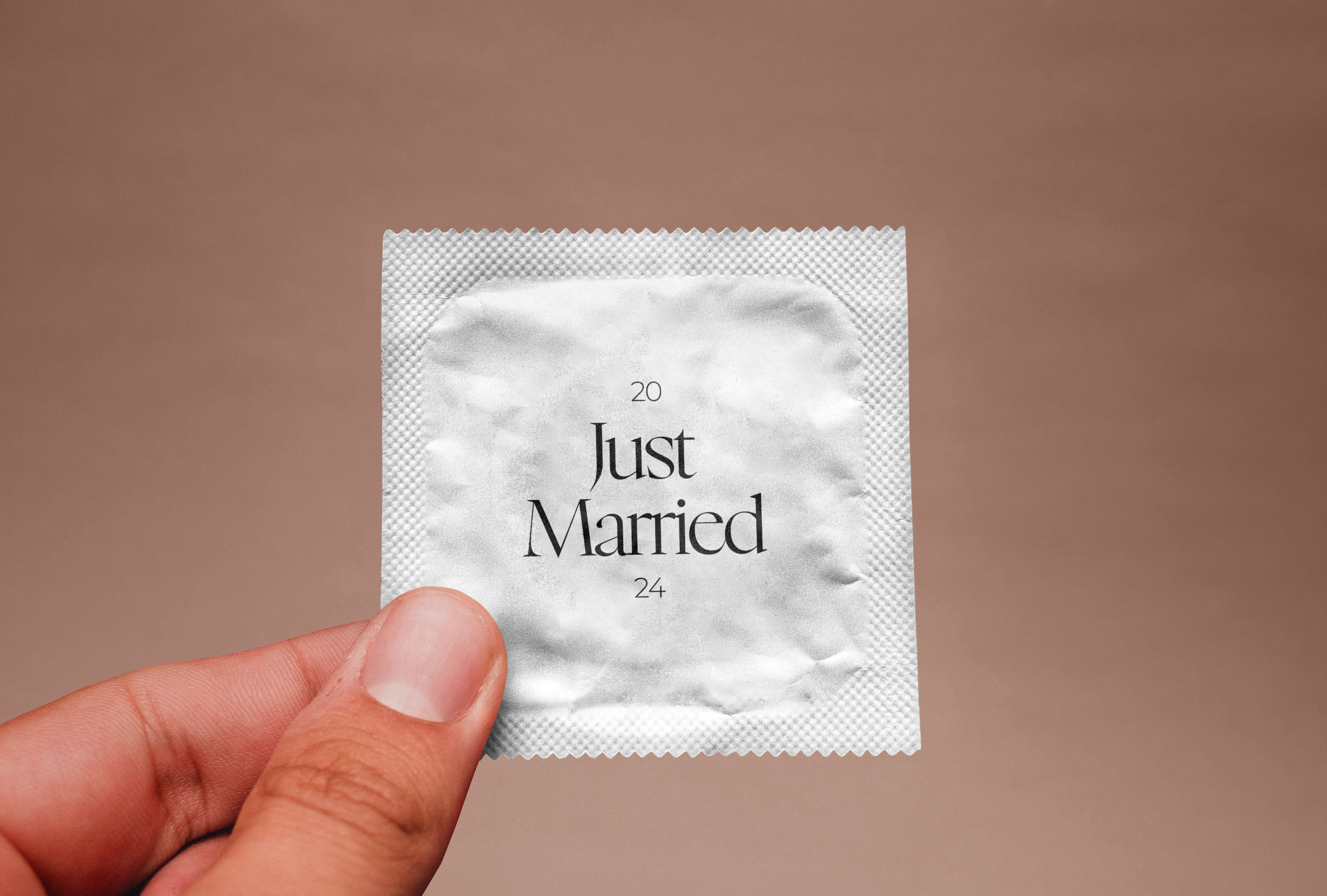 I created a "Just Married" condom for the business. YEP.