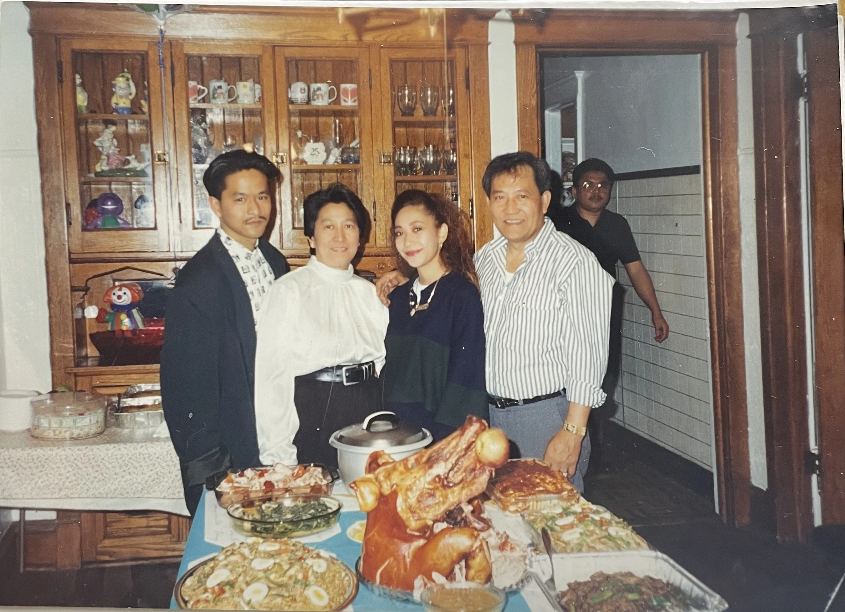 My father (left) and his parents and sister.