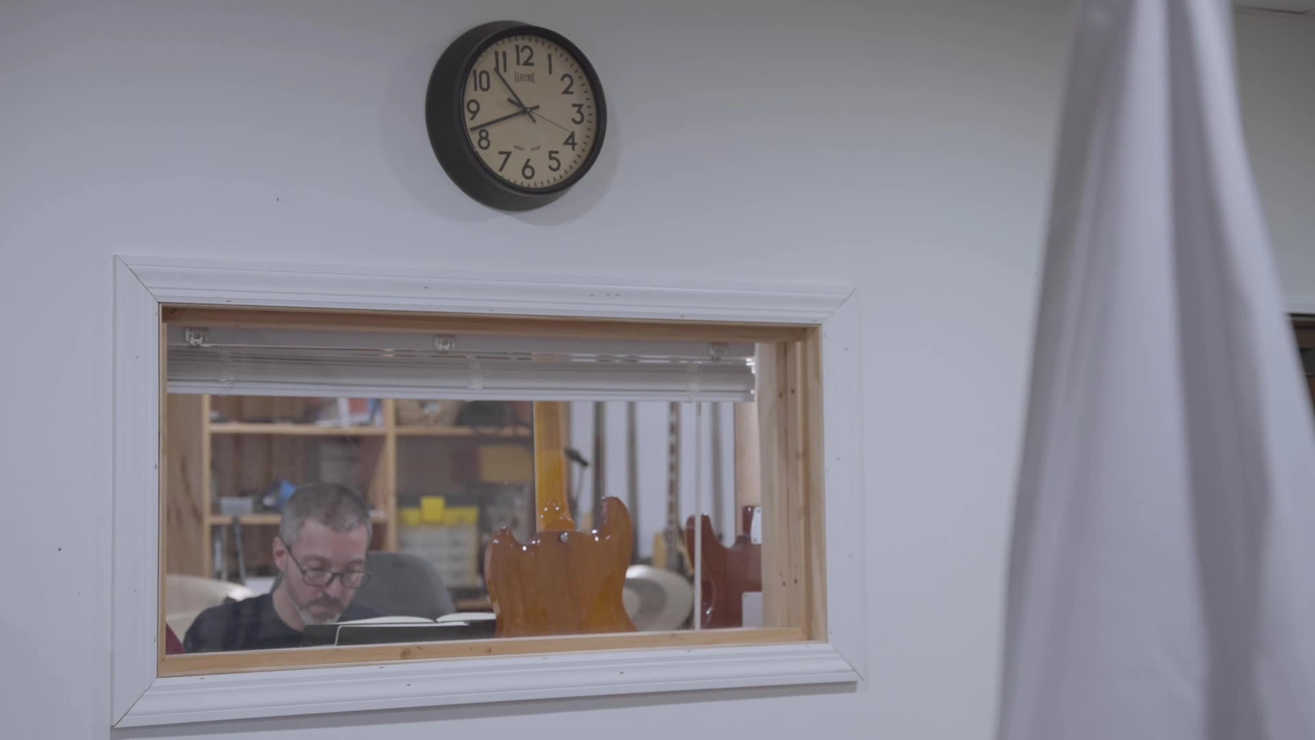 Still from the film. Composer Justin Morell in his home studio.