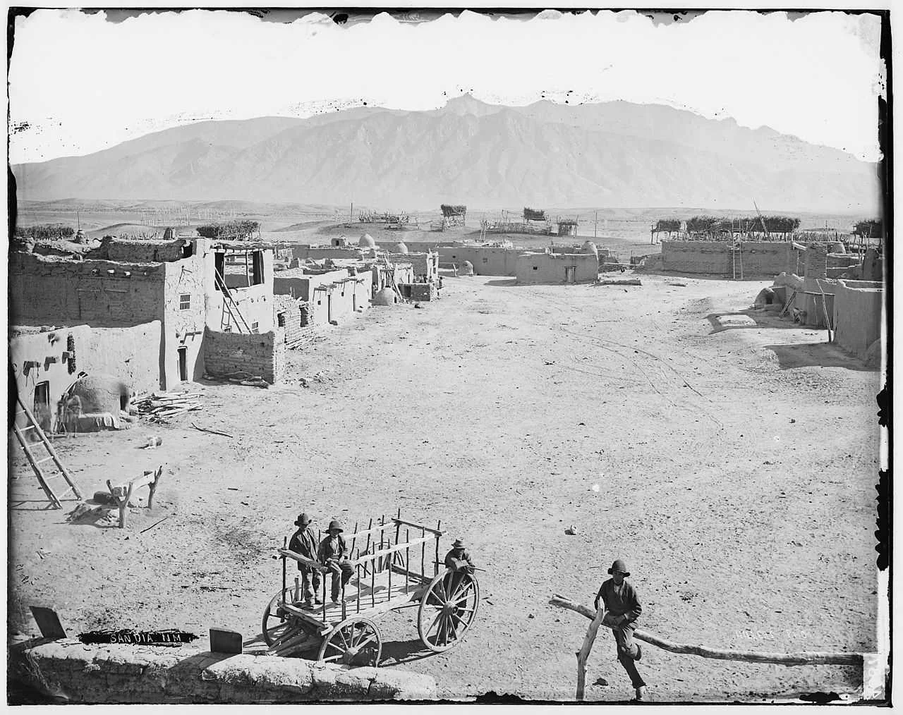 Sandía Pueblo in the 1880s, Photo by John K. Hiller via Wikimedia Commons.