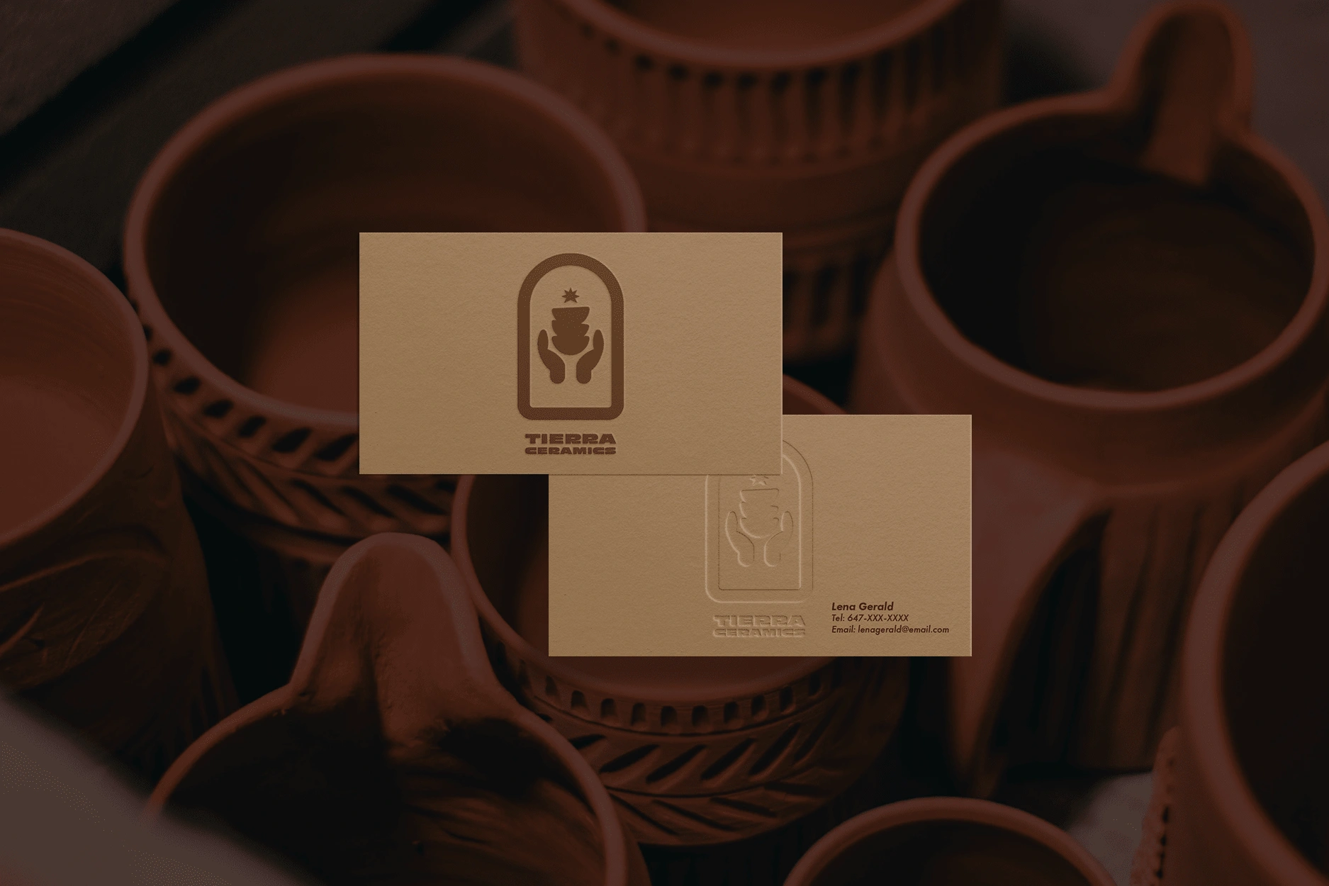 TC business card with embossed logo detail