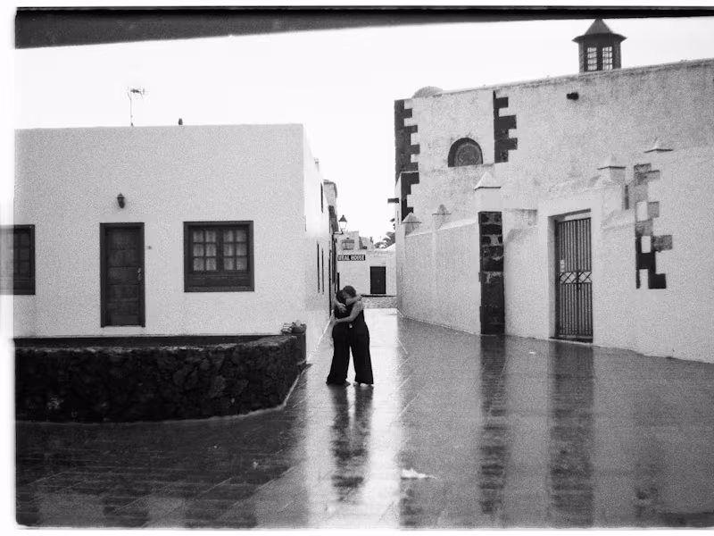 Cover image for Black and white 35mm. Rain, coastline, and strangers caught ...