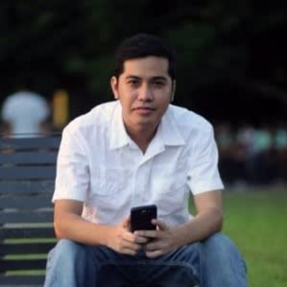 John M Buladaco