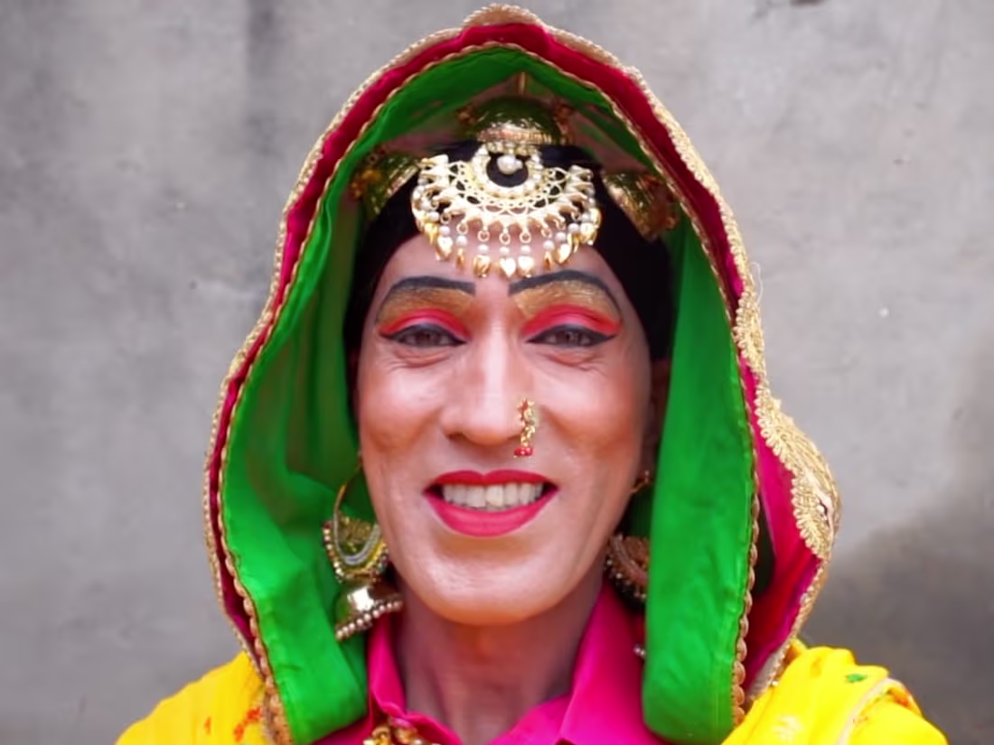 Cover image for BBC short doc about a female folk dance done by a group of men